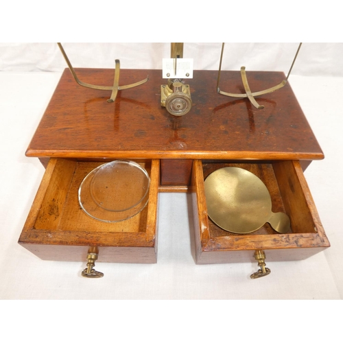 373 - An antique Pharmacist/ Apothecary set of scales.