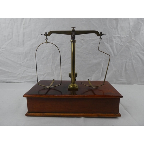 373 - An antique Pharmacist/ Apothecary set of scales.