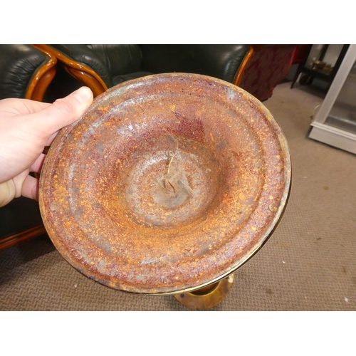 384 - An antique brass freestanding ashtray, with built in matchbox holder & cigar rests.