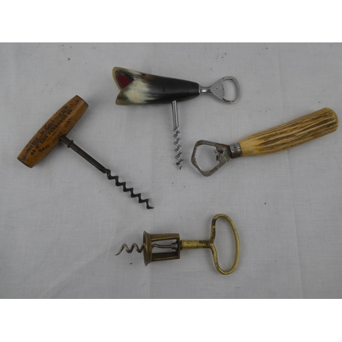 386 - A collection of vintage bottle openers & corkscrews.