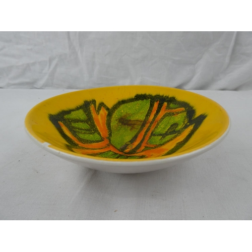 387 - A vintage Poole Pottery bowl with decorative design.