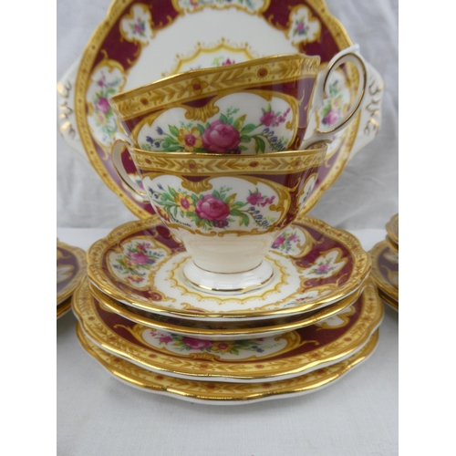 394 - A decorative Royal Albert Lady Hamilton tea set, to include 6 cups, saucers, side plates, milk jug, ... 