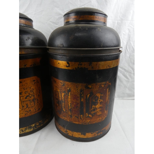 399 - A large pair of decorative shop counter tea caddies, each measuring 40cm tall.