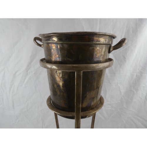 401 - A vintage silver plated ice bucket on stand. 57cm tall.