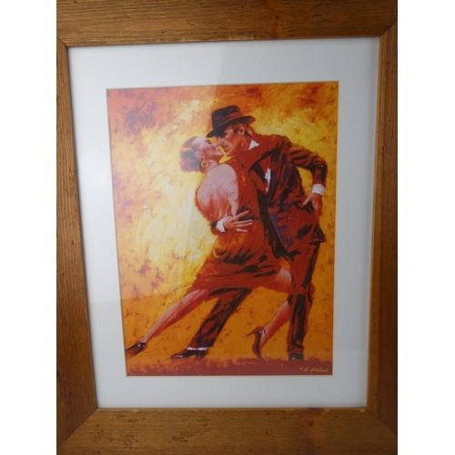 402 - A pair of pine framed prints of dancers, each measuring