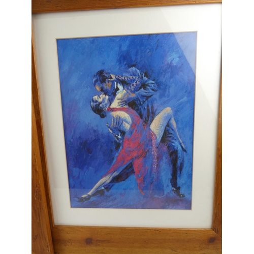 402 - A pair of pine framed prints of dancers, each measuring