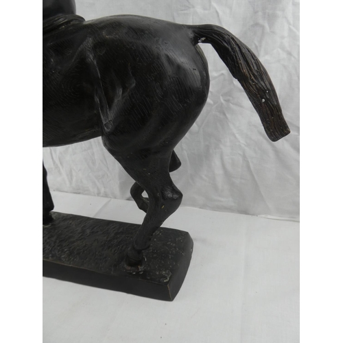 406 - A stunning large hollow cast bronze figure of a jockey on horse, no visible signature, measuring 24x... 