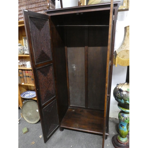 411 - A large modern double rattan wardrobe. Measuring approx 35.5x75.5x23.5inches.