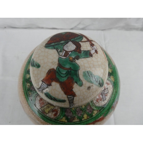 420 - An antique Chinese ginger jar with decorative hand painted design, measuring 21cm.