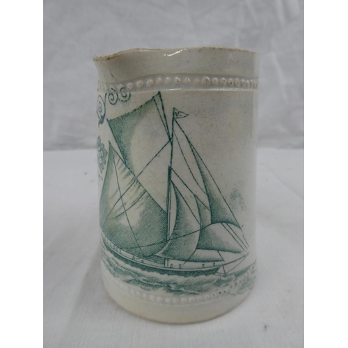 422 - A decorative antique milk jug, 'Shamrock 1888'. 4inches tall.