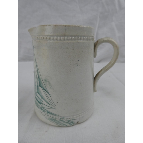 422 - A decorative antique milk jug, 'Shamrock 1888'. 4inches tall.