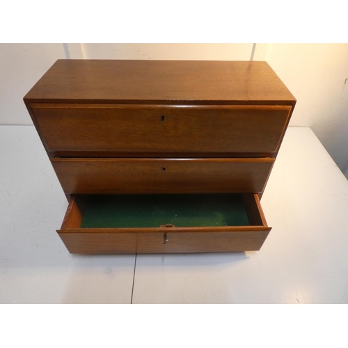 456 - A handmade wooden collectors cabinet of 3 locking drawers with key. Measuring approx 17x13.5x7inches... 