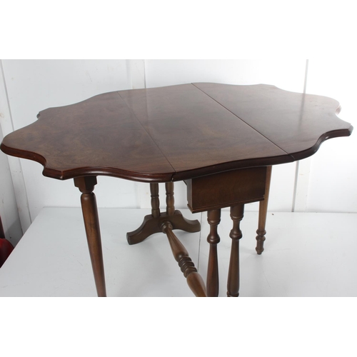 461 - A stunning antique drop leaf occasional table.