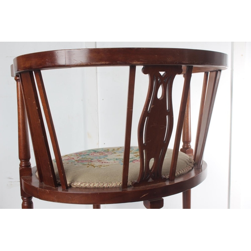 463 - An antique/ Edwardian bow back occasional chair with decorative needlepoint seat.