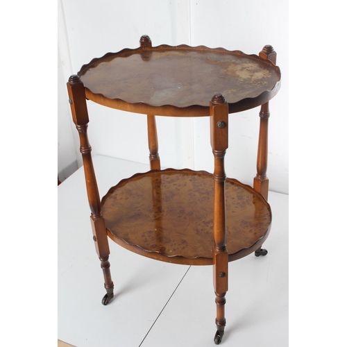 468 - A small occasional table/ trolley, in need of restoration. Measuring approx 17x14.5x24inches.