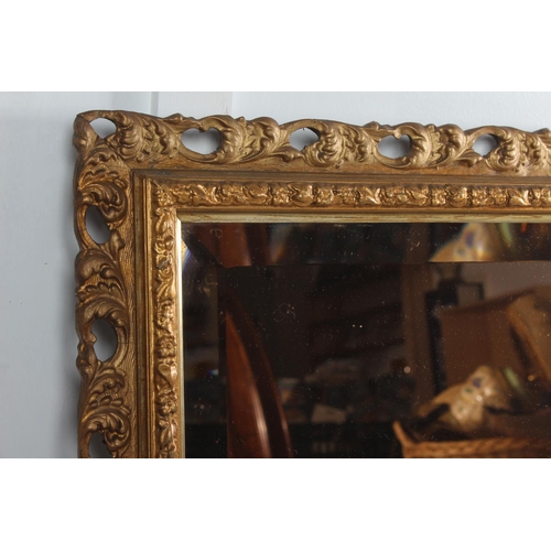 493 - A stunning antique Edwardian tinted mirror with bevelled glass & decorative gilt frame, measuring 64... 