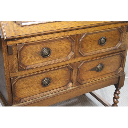 502 - An antique oak writing bureau. 29x15.5x40inches.