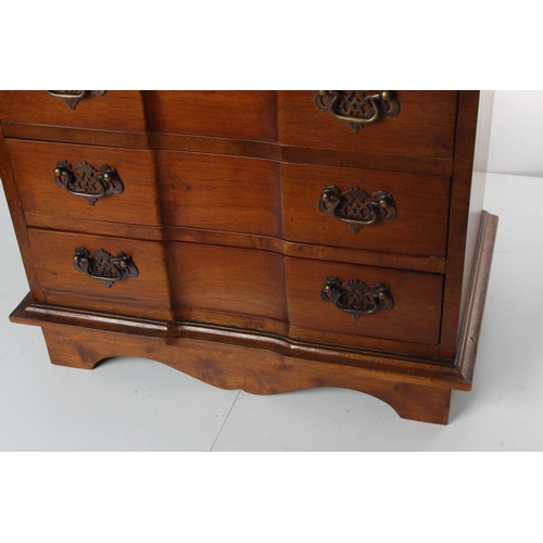 503 - A stunning antique chest of drawers with step front top & decorative brass handles, measuring 23x14.... 