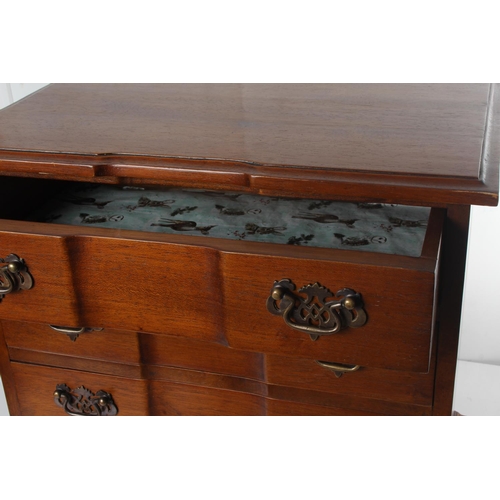 503 - A stunning antique chest of drawers with step front top & decorative brass handles, measuring 23x14.... 