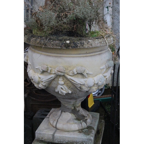 509 - A stunning pair of large antique style garden urns on pedestal bases, with decorative design. Each U... 