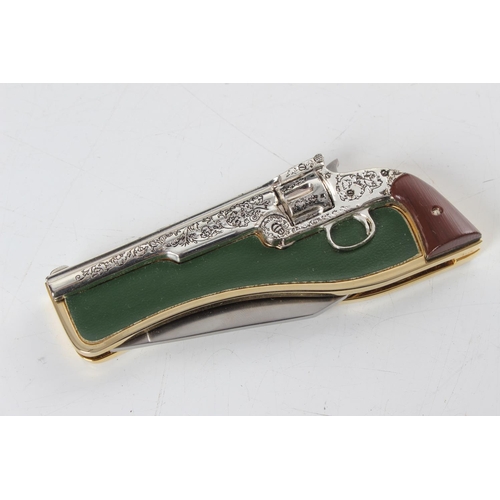 259 - A Franklin Mint novelty pocket knife, 'Smith & Wesson - .44 Caliber'.