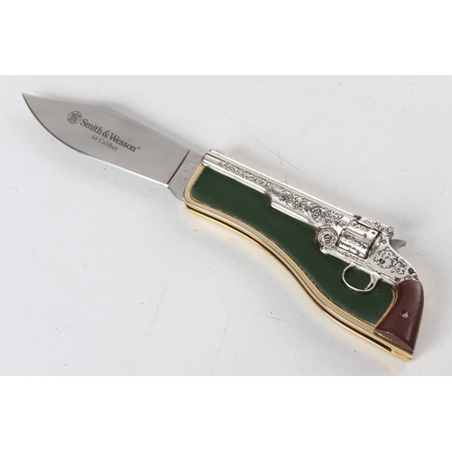 259 - A Franklin Mint novelty pocket knife, 'Smith & Wesson - .44 Caliber'.