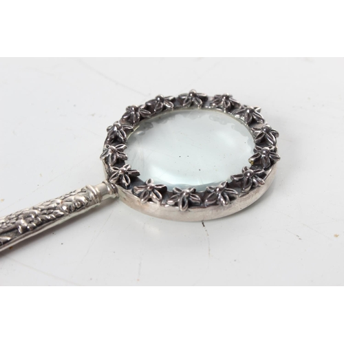 265 - An antique sterling silver framed magnifying glass, stamped 925.