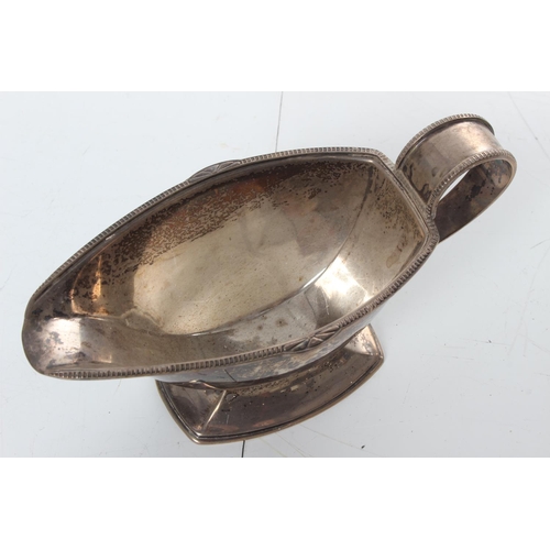 267 - An antique sterling silver milk jug, weighing