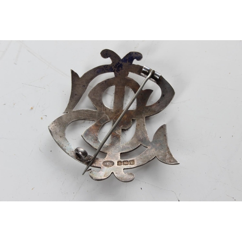 270 - An antique handmade sterling silver Monogramed brooch, 'SIB'.