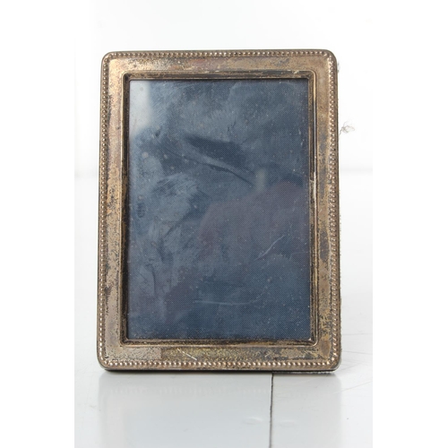 283 - A sterling silver photo frame, measuring 3x4inches.