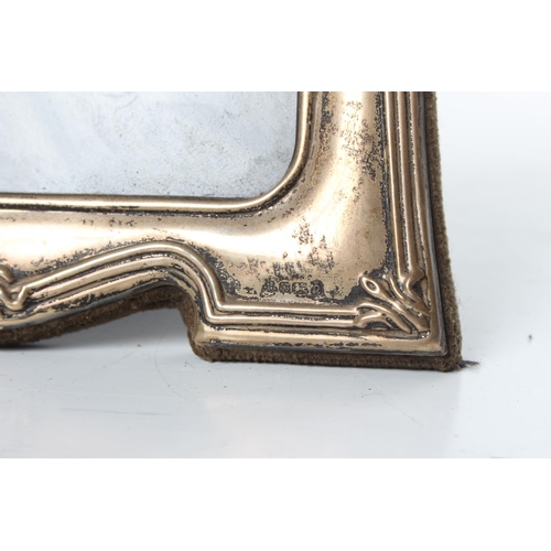 288 - A sterling silver Art Nouveau photo frame, measuring 14x18cm.