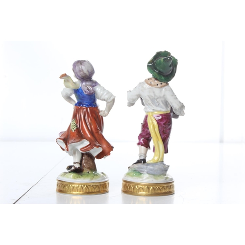 293 - A pair of decorative antique ceramic figures. measuring 5.5inches.