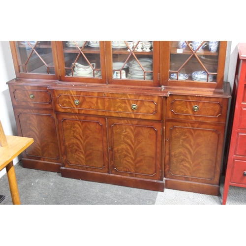 297 - A modern bookcase bureau, with decorative glass doors, measuring 15x78x71inches.