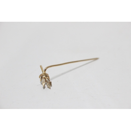 277 - A stunning 9ct gold tie pin with