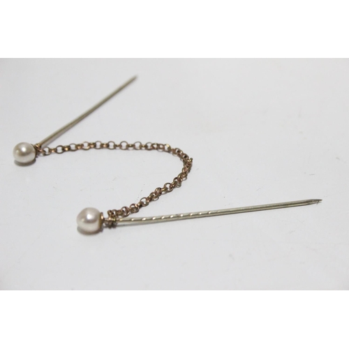 281 - A stunning 9ct gold tie pin set with pearls.