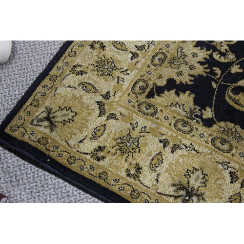 248 - A decorative floor rug, measuring