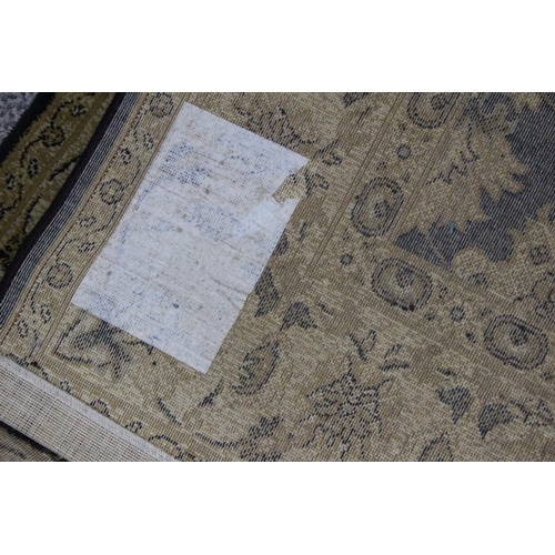 248 - A decorative floor rug, measuring