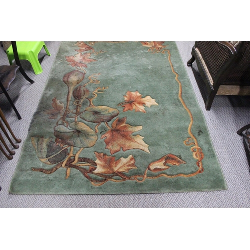 249 - A decorative floor rug by The V & A Nouveau Rug Collection, measuring 1.4m x 2.0m