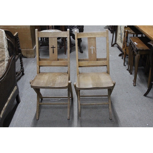 335 - A pair of vintage folding Church chairs, with 'Cross' cut out to splats.