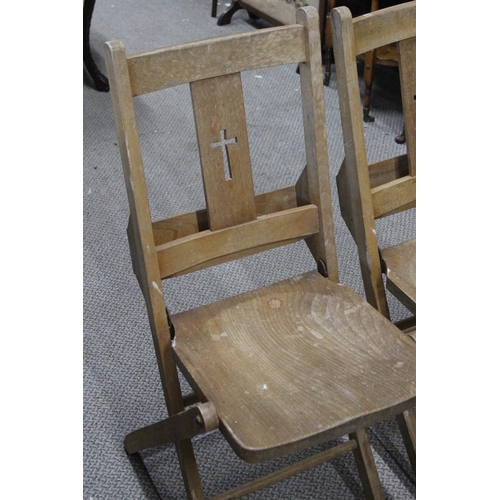 335 - A pair of vintage folding Church chairs, with 'Cross' cut out to splats.