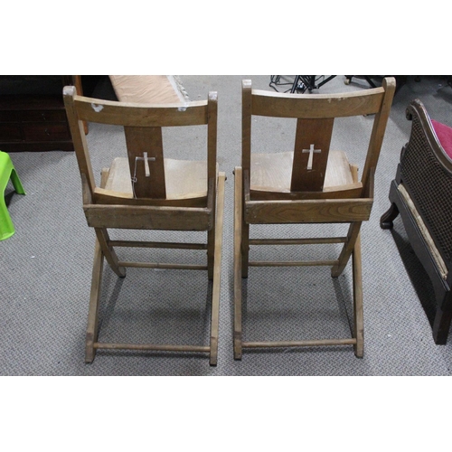 335 - A pair of vintage folding Church chairs, with 'Cross' cut out to splats.