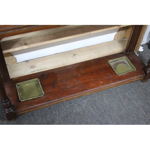 449B - An antique mahogany hall stand with mask head carving detail and original drip trays. Measuring appr... 