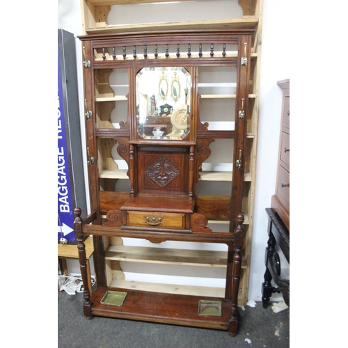 449B - An antique mahogany hall stand with mask head carving detail and original drip trays. Measuring appr... 