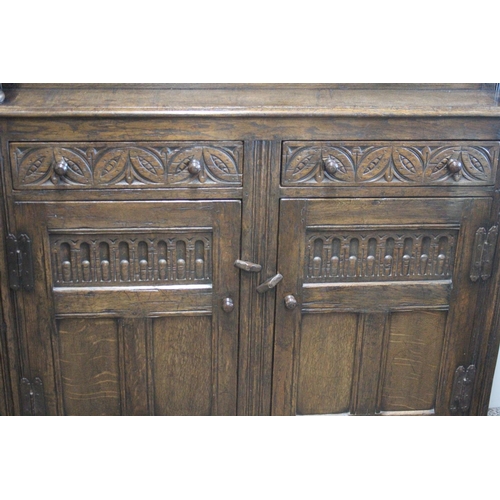 496 - A stunning large antique Court Cabinet/ press, with highly carved decorative panels. Measures 18x48x... 