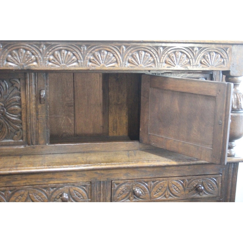 496 - A stunning large antique Court Cabinet/ press, with highly carved decorative panels. Measures 18x48x... 