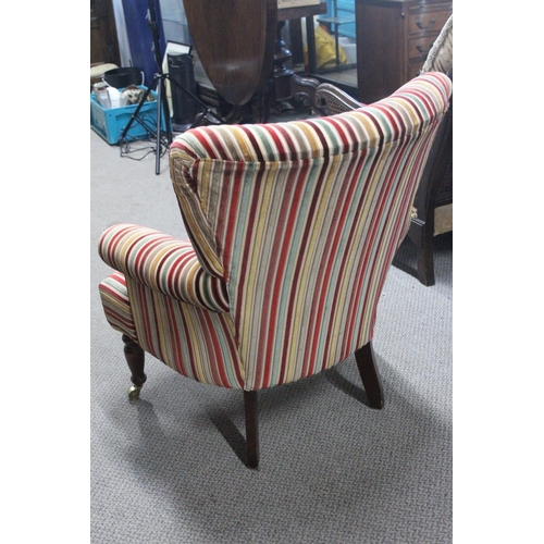 500B - A small ladies upholstered armchair.