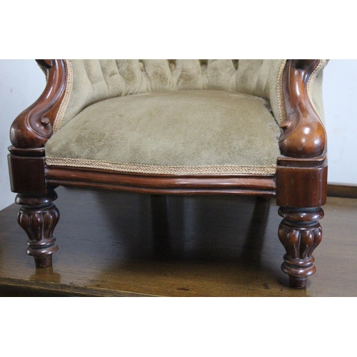 500C - A stunning antique mahogany deep button backed miniature armchair. Measuring approx 21.5inches tall.