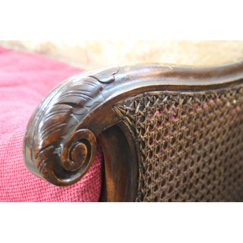 501 - A stunning antique Berger Cane sofa. Measuring approx 55inches wide.