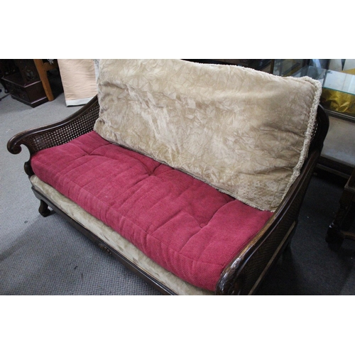 501 - A stunning antique Berger Cane sofa. Measuring approx 55inches wide.