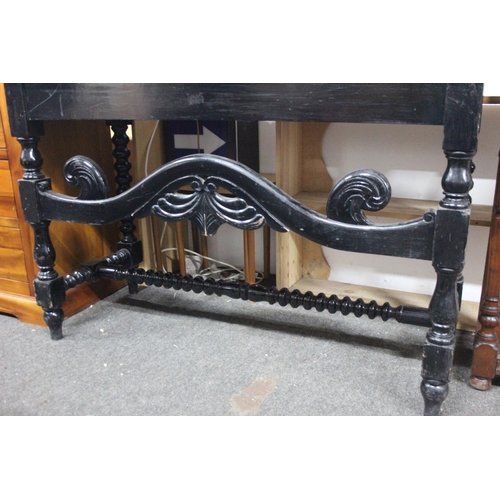 512 - A stunning antique oak ebonised table with gallery back. Measuring approx 48x19.5x38.5inches.